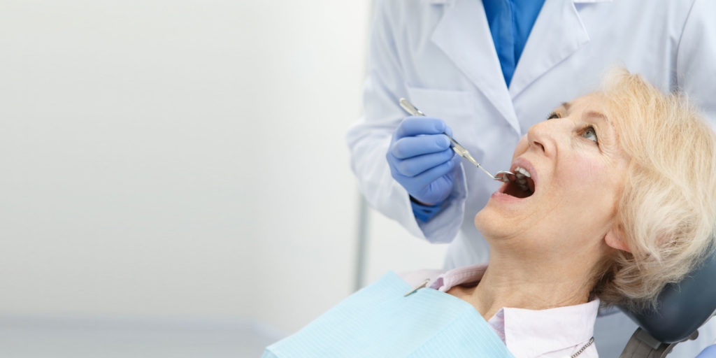 dental patient undergoing oral pathology exam Peabody, MA