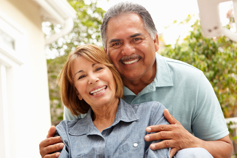 implant supported dentures patient smiling Peabody, MA